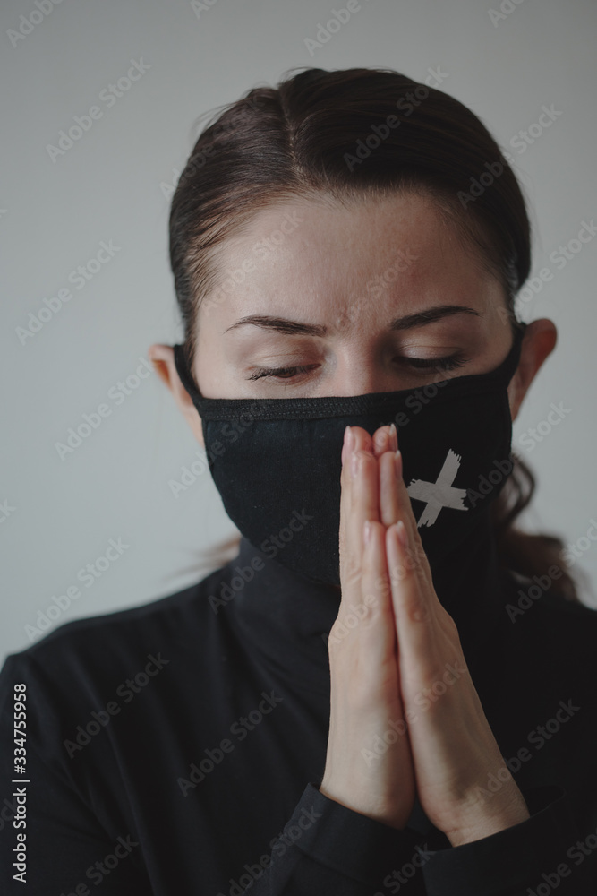 Girl in a black mask against viruses and flu Girl in a black mask against viruses and flu