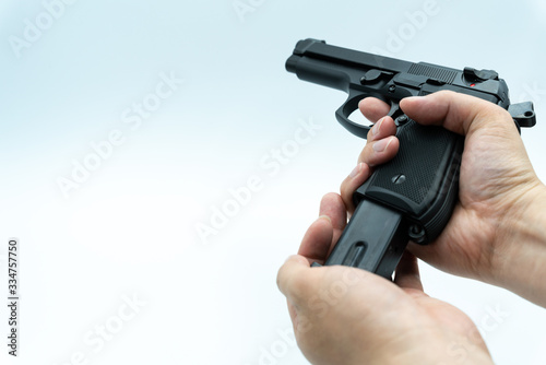 Model gun shot on white background