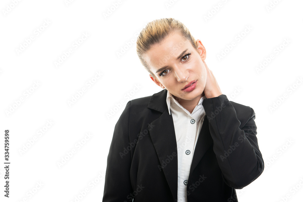Young female assistant manager holding neck like hurting Young female assistant manager holding neck like hurting
