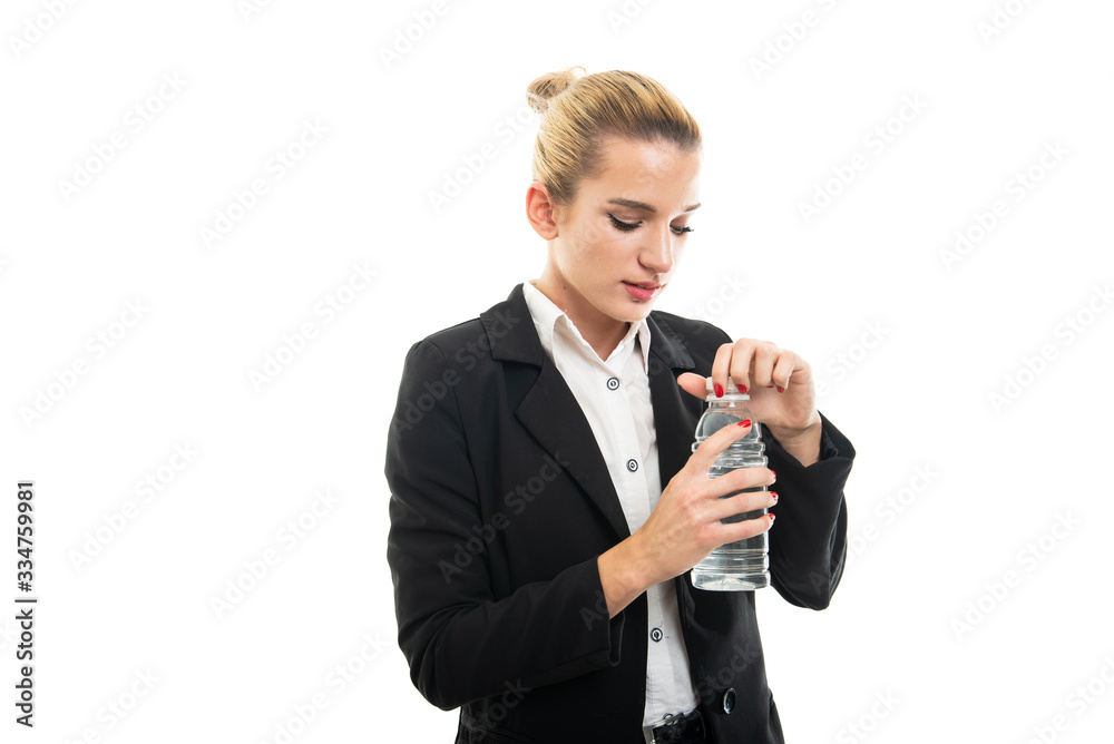 Portrait of beautiful young female assistant manager opening water Portrait of beautiful young female assistant manager opening water