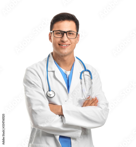 Handsome male doctor on whi...