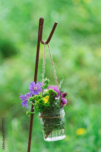 casual arrangement of flowers for a country wedding photo