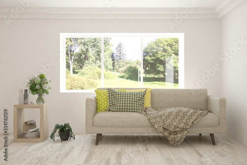 White living room with sofa and summer landscape in window. Scandinavian interior design. 3D illustration