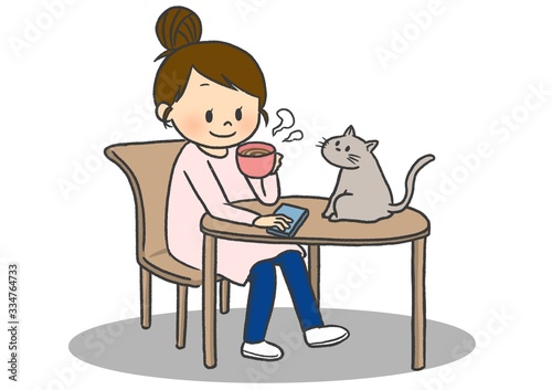 猫と一緒にのんびり過ごす人