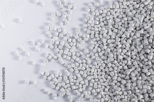 Polypropylene granule close-up background texture. plastic resin ( Masterbatch).Grey chemical granules for industrial plastic production