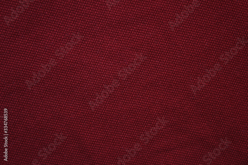 Dark burgundy red fabric texture background, empty abstract close up brown tone wallpaper. Empty dark fabric pattern, natural cotton blend design with blank copy space top view
