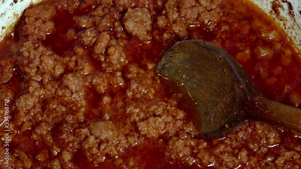 Bolognese ragout slow cooking closeup, zoom out Bolognese ragout slow cooking closeup, zoom out