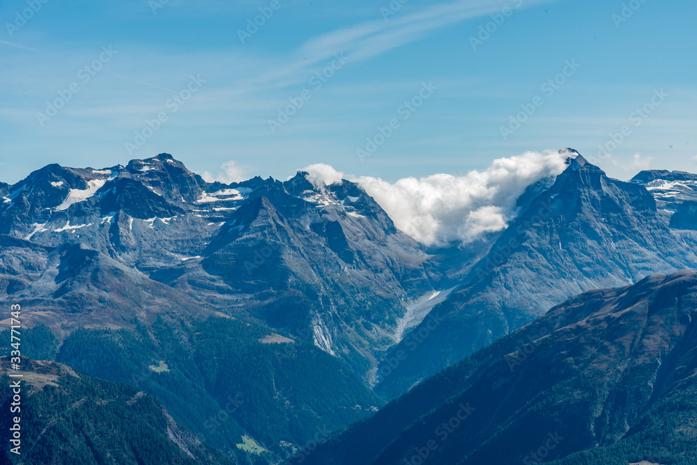 Panoramic view of the Swiss Alps in the Jungfrau region, Switzerland. Travel concept Panoramic view of the Swiss Alps in the Jungfrau region, Switzerland. Travel concept