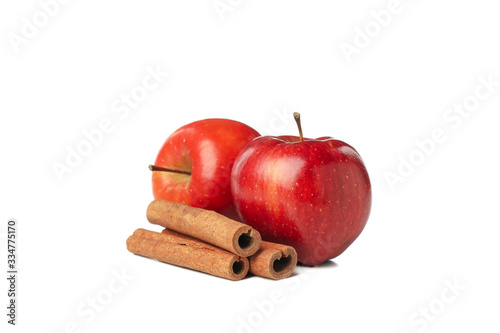 Apples and cinnamon isolated on white background. Natural treatment