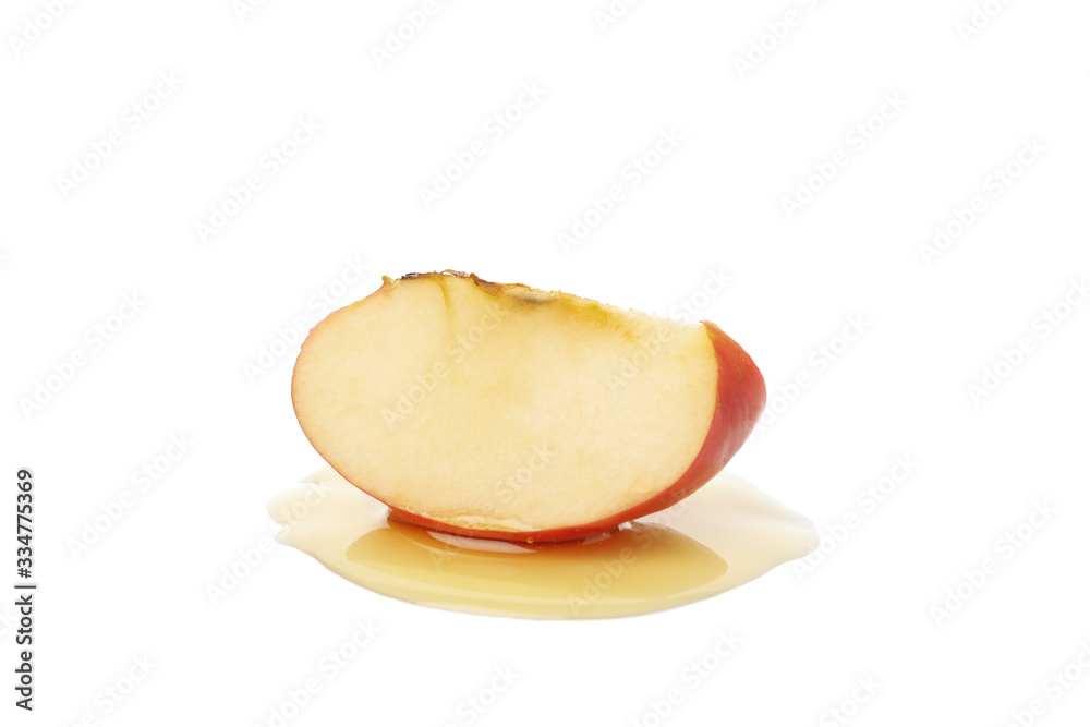 Apple slice and honey isolated on white background. Natural treatment Apple slice and honey isolated on white background. Natural treatment