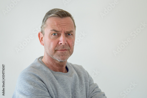 Half-turn bust portrait of middle-aged man © michaelheim