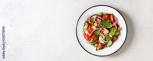 Fresh vegetable salad. Vegetarian food.Concept for a tasty and healthy meal.Top view.Copy space
