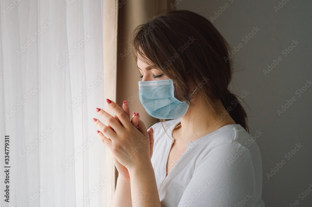 Coronavirus covid-19. Woman praying to God requesting that the coronavirus covid 19 not spread beyond control. Coronavirus covid-19. Woman praying to God requesting that the coronavirus covid 19 not spread beyond control.