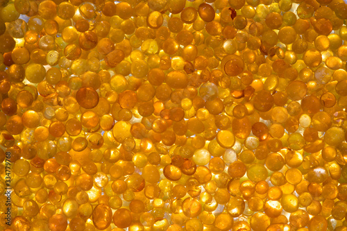 Golden silica gel dessicant reflecting light