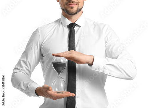 Businessman with hourglass ...