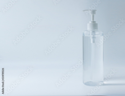 Close up alcohol gel cleaning gel for hands on white background