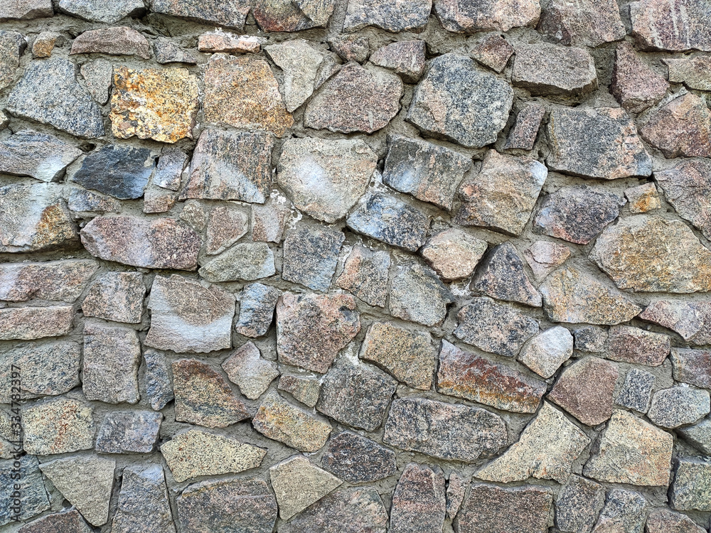 Background of large stones wall texture with different colors Background of large stones wall texture with different colors