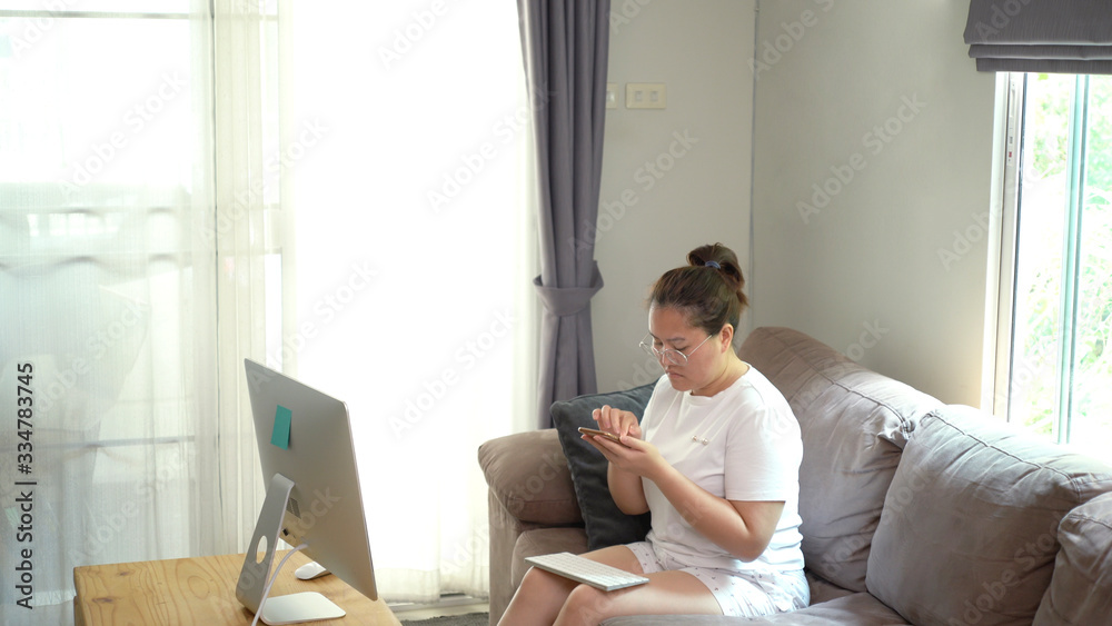 Asian women using smartphone. work from home Asian women using smartphone. work from home
