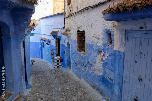 Old blue painted street in city of  Chefchaouen,Morocco. © leospek