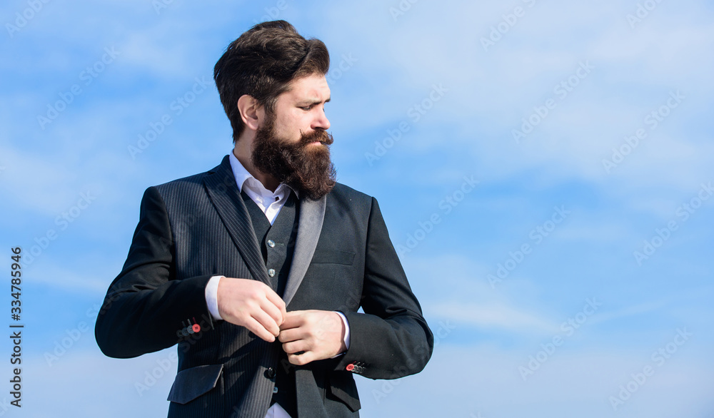 Fashion trend. Guy beard and mustache wear formal clothes. Just right. Businessman bearded face sky background. Flawless outfit. Man formal suit adjusting jacket. Male fashion formal menswear Fashion trend. Guy beard and mustache wear formal clothes. Just right. Businessman bearded face sky background. Flawless outfit. Man formal suit adjusting jacket. Male fashion formal menswear