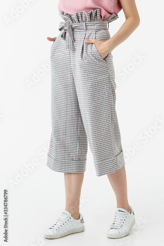 girl in grey capri shorts