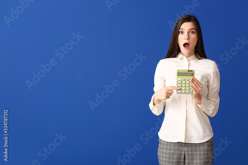 Shocked young woman with ca...
