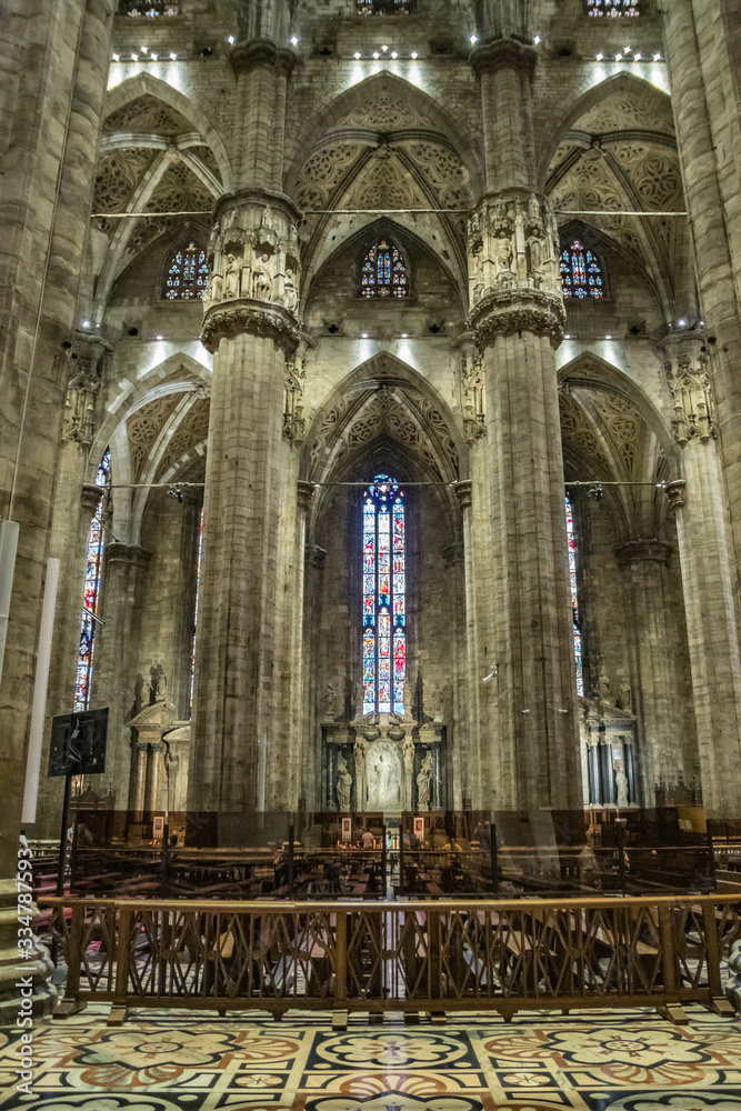 MILAN, ITALY - AUG 1, 2019: Interior of the famous Cathedral Duomo di Milano on piazza in Milan, Italy. Super wide angle lens shot. Vertical