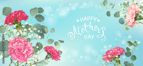 Inscription Happy Mothers Day with bunch of red and pink carnations, eucalyptus branches and white gypsophila on a blue pastel background. Template for greeting card, banner, poster, voucher design