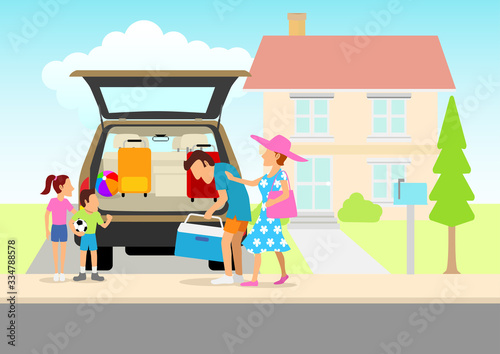 Family packing things into car trunk