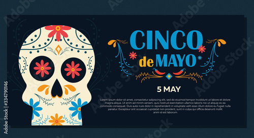 Cinco de Mayo on May 5th. Design banner for the federal holiday in Mexico with traditional Mexican symbols, skull, flowers, Mexican cacti, red pepper, maracas, sombrero. photo