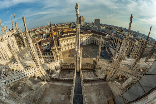 Milan, Italy - Aug 1, 2019: Aerial View from the roof of Milan Cathedral - Duomo di Milano, Lombardy, Italy. Fish eye lens shot