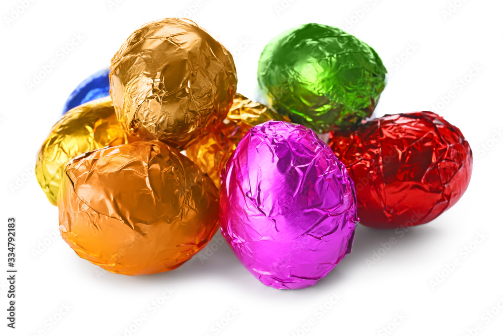 Sweet chocolate eggs on white background Sweet chocolate eggs on white background