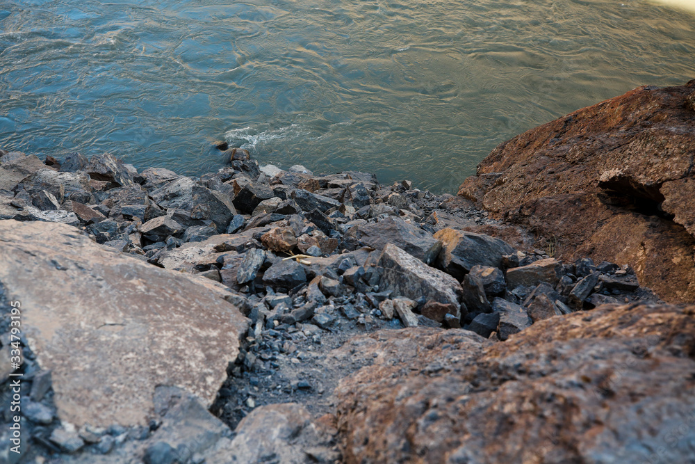 stormy mountain rocky river with clear water