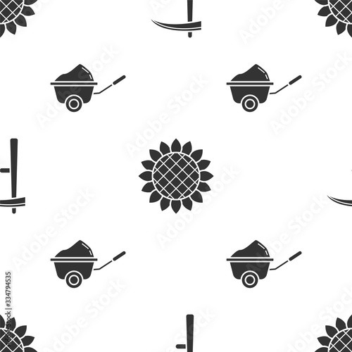 Set Scythe, Sunflower and Wheelbarrow with dirt on seamless pattern. Vector