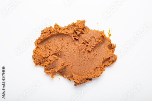 White miso paste heap on a white background, top view