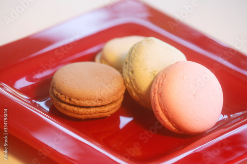 Macarons in different colours on a background