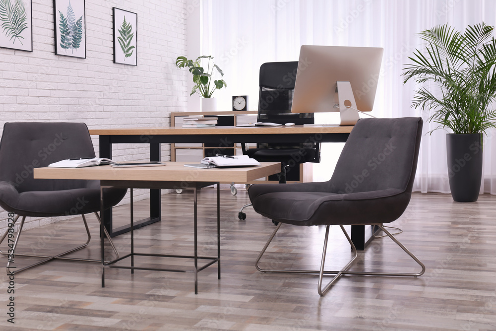 Fototapeta premium Director's office with large wooden table. Interior design