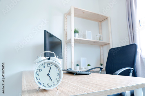 Clock on work desk in studio Time of businessman. Work from home