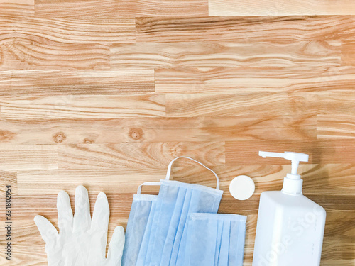 Pair of latex medical gloves, medical masks, sanitizer gel for hand hygiene, remedies, soap, disinfector. Coronavirus prevention