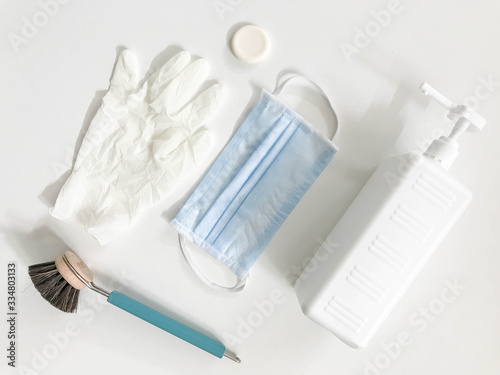 Pair of latex medical gloves, medical masks, sanitizer gel for hand hygiene, remedies, soap, disinfector. Coronavirus prevention