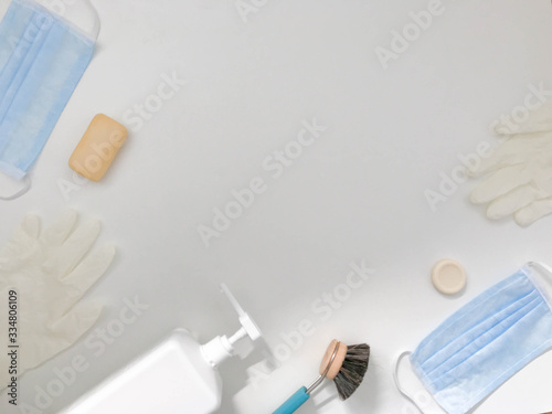 Pair of latex medical gloves, medical masks, sanitizer gel for hand hygiene, remedies, soap, disinfector. Coronavirus prevention