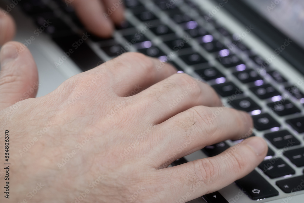 Image of man's hands typing. Selective focus Image of man's hands typing. Selective focus