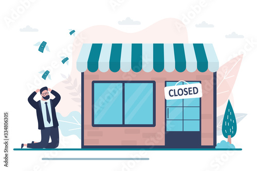 Shop closed. Empty storefront and plate on the door, store is not working. Shocked businessman is on his knees