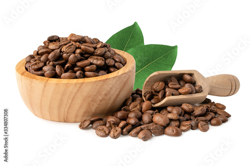 Coffee beans in wooden bowl isolate on white background with clipping path.