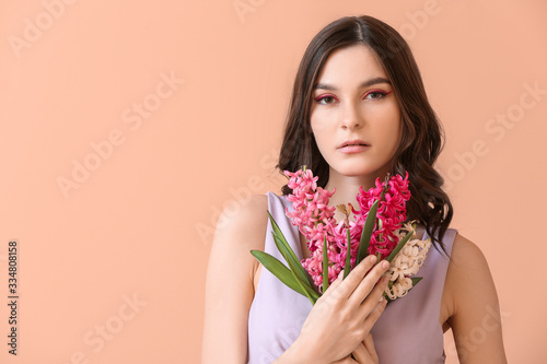 Beautiful young woman with ...