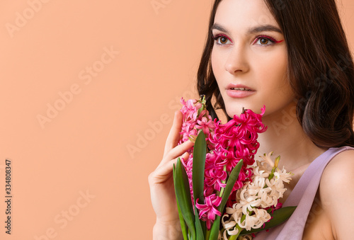 Beautiful young woman with ...