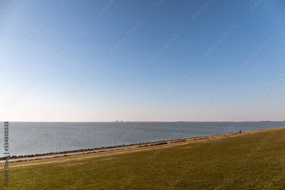 blue sky and wide coastline with no people 