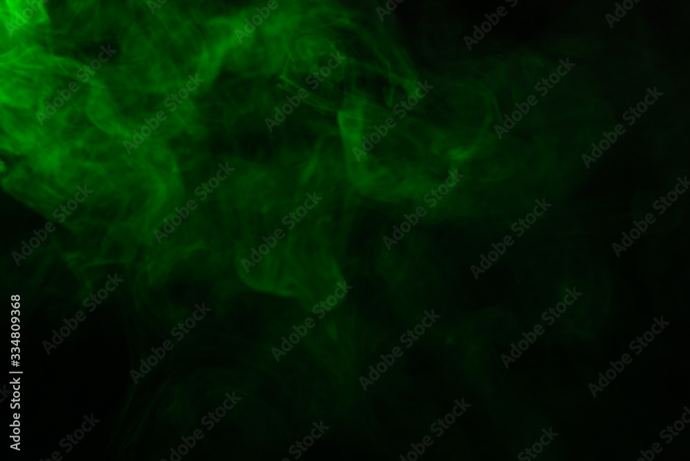 Green steam on a black background. Green steam on a black background.