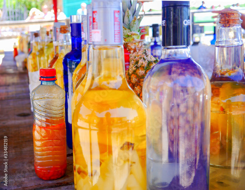 colorful glass bottles of Brazilian cachaça