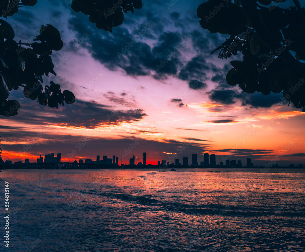 sunset sky sun clouds buildings horizon ocean nature dusk city beautiful impressions red lighting summer miami florida sunset sky sun clouds buildings horizon ocean nature dusk city beautiful impressions red lighting summer miami florida